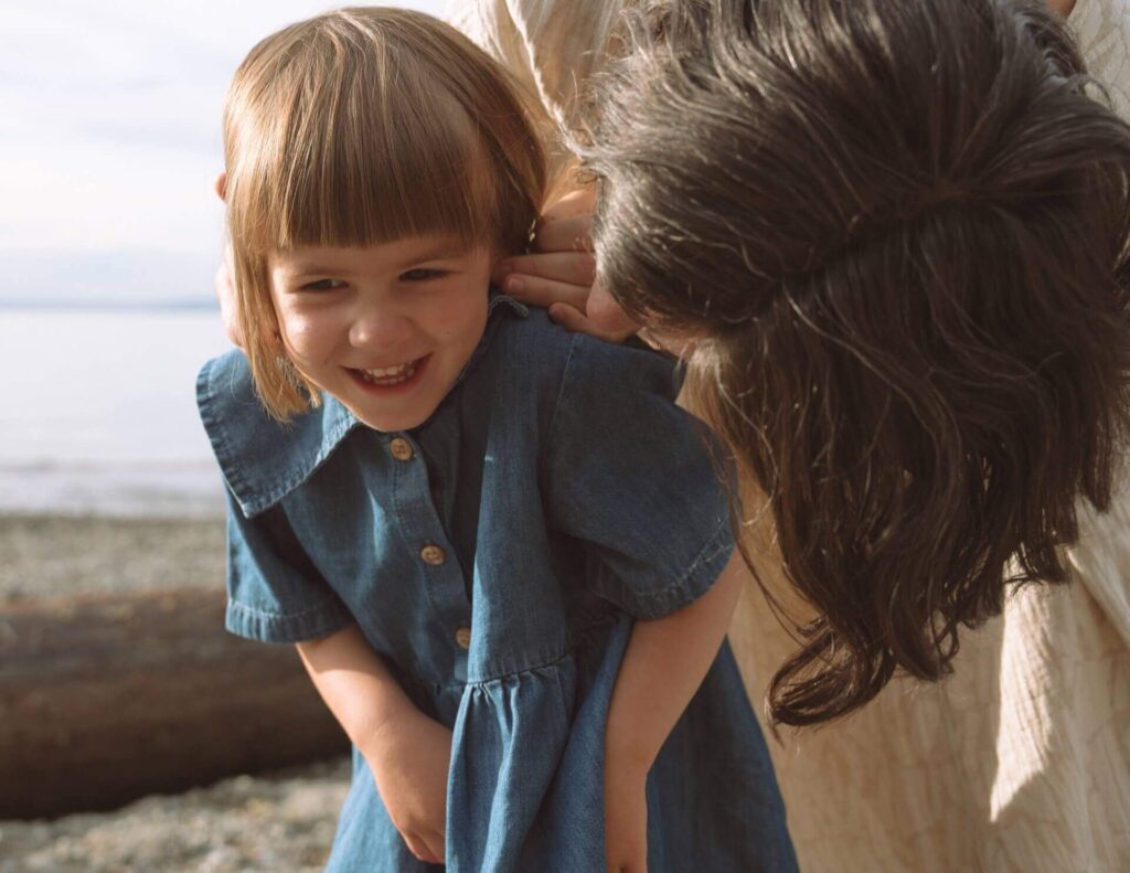 candid family time at beach