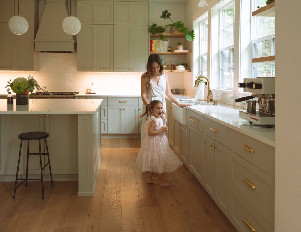 mother daughter in kitchen at home