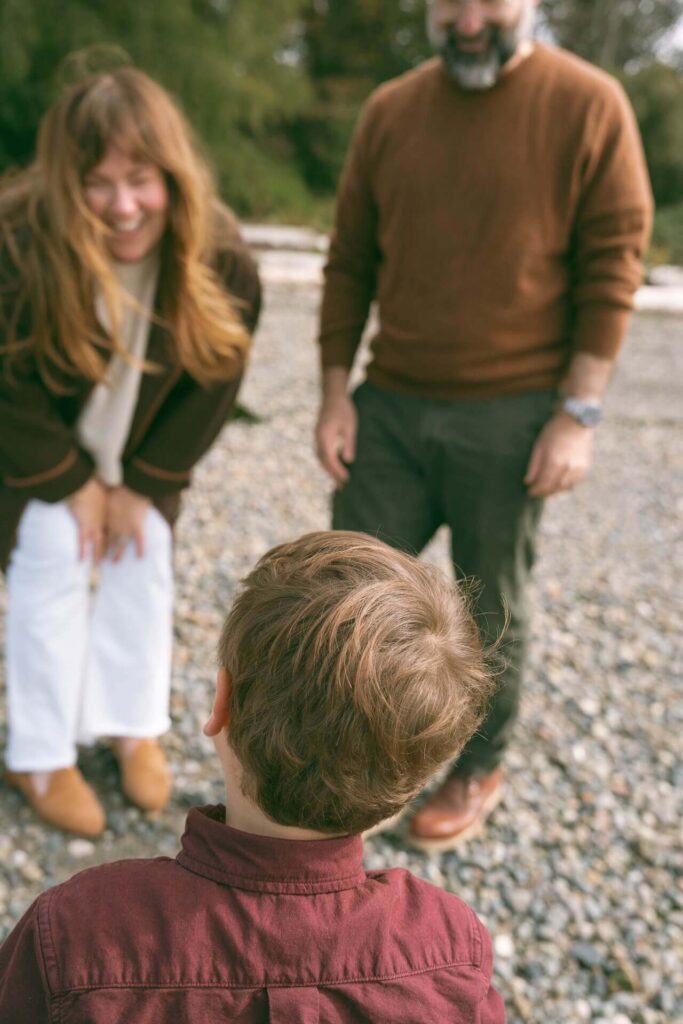 family of three at seattle beach