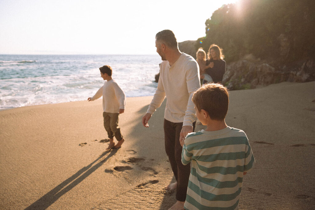 candid family beach photos in summer