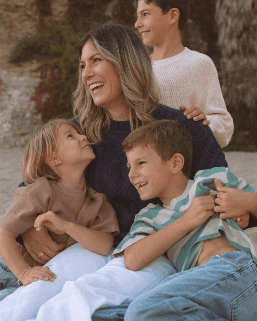 mother sitting with kids at tablerock beach