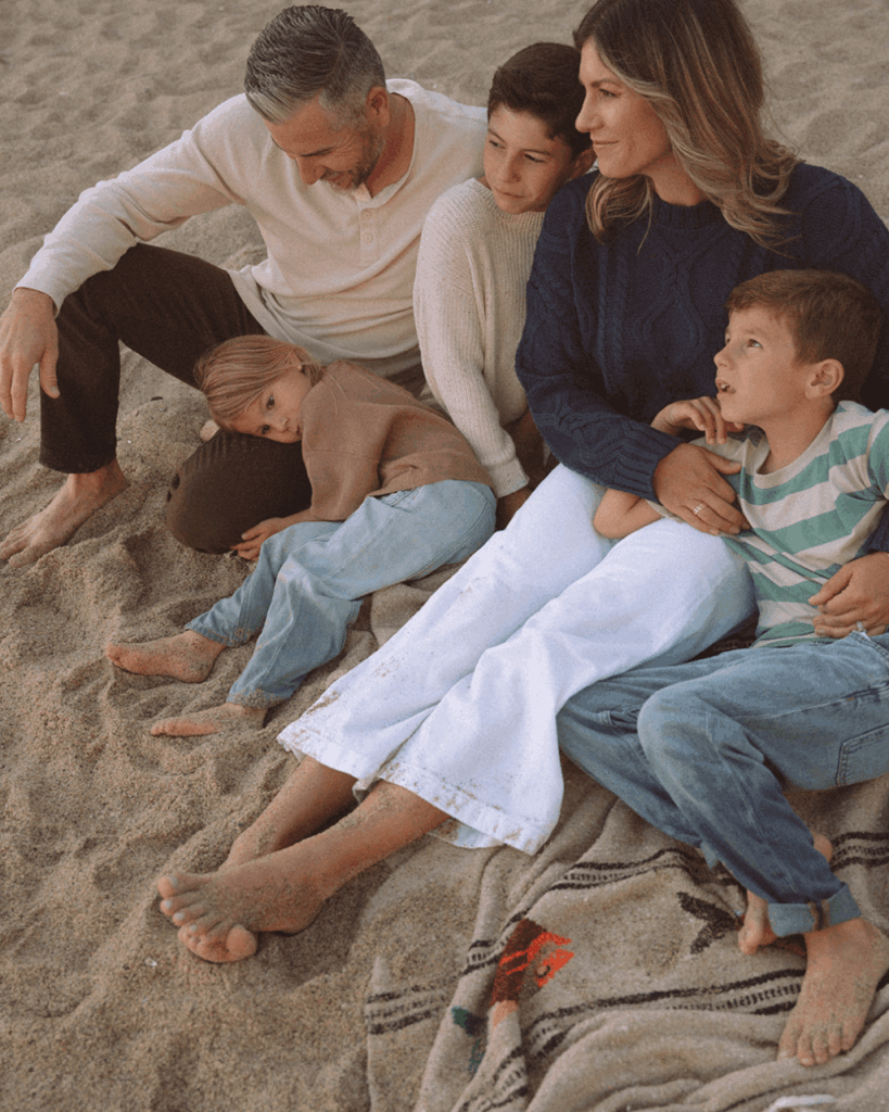 family of five portrait in tablerock beach