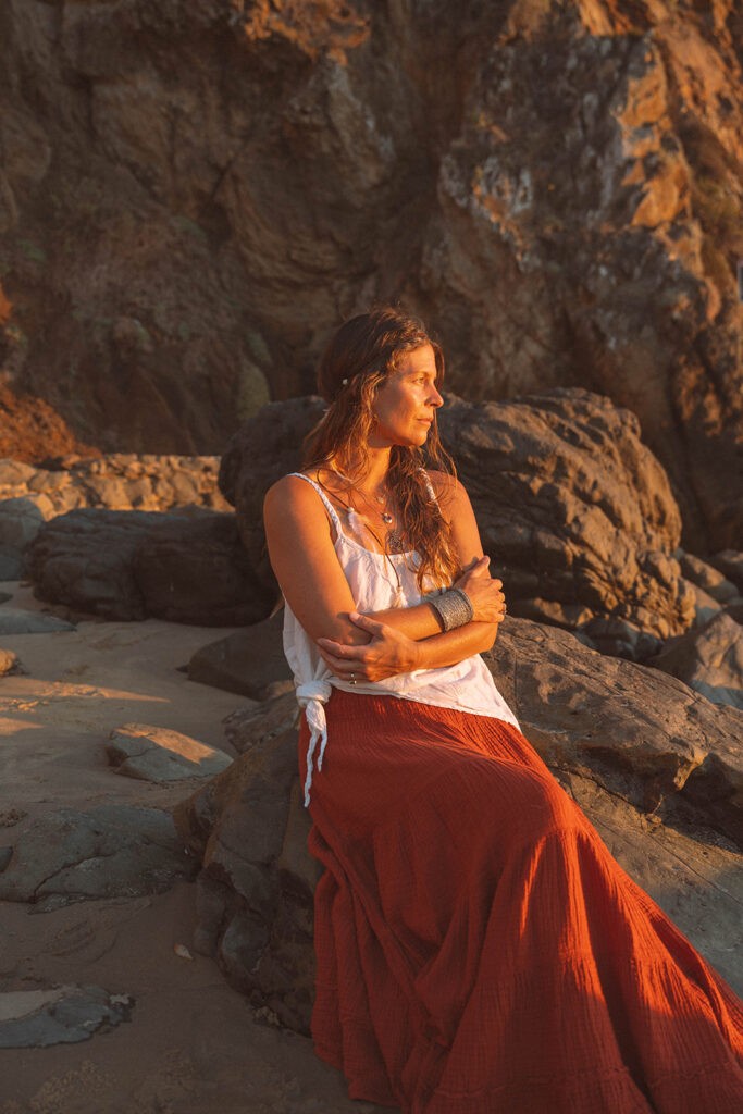 Editorial-style portrait of a wellness business owner captured during Laguna Beach branding photos at golden hour.