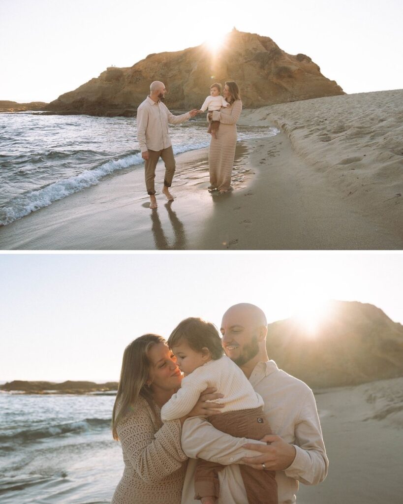 Parents holding their baby under golden sunlight during family photos in Laguna Beach.